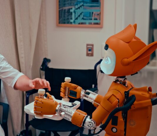 “AI로 똑똑하게 건강 챙기기… 일상 속 건강 관리, 쉽고 실용적으로” Man gives robot bottles on a tray